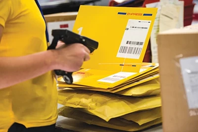 Shipping label on yellow envelope